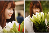 Hot girl Ngoại giao thẹn thùng làm duyên bên hoa loa kèn