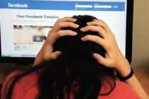 Con bị bắt nạt qua mạng, cha mẹ nên làm gì?