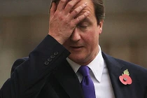 Thủ tướng Anh buộc phải trì hoãn tấn công Syria