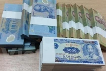 Dịch vụ đổi tiền lẻ “nóng” trước Tết Đinh Dậu: Phí lên tới 40%
