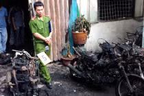 Xông vào nhà cháy cứu ông, cháu chết thảm