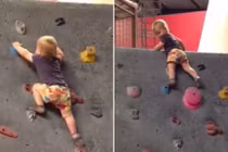 Bé gái kỳ lạ chưa biết đi đã biết leo tường 