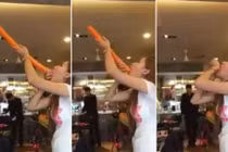 Gái xinh nuốt bóng bay dài 1,3m gây kinh ngạc