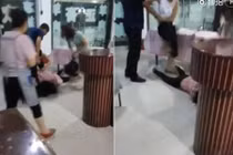 Đánh đập dã man bồ nhí của chồng ngay tại bàn ăn