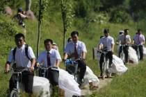 Cưới tập thể...rước dâu bằng xe đạp