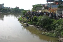 Thanh Hóa: thi thể phụ nữ chỉ mặc áo ngực trôi sông 