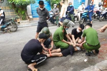 Khống chế người đàn ông chặn ô tô xin tiền, dọa giết người đi đường