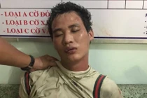 Hùng tại cơ quan công an.