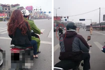 Công an đèo gái vượt đèn đỏ... CSGT phớt lờ