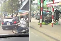 Ngứa mắt cảnh tắc đường, ô tô leo lên vỉa hè HN