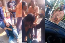 Dửng dưng đứng xem viên cảnh sát đánh con gái giữa đường