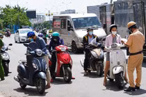 Bình Dương có thể cho người đã tiêm vắc xin COVID-19 ra đường