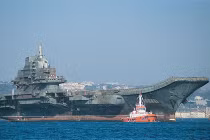 Thân xác “tàn tạ” tàu Liêu Ninh ngày về Trung Quốc