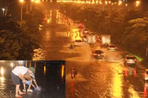 Mưa lớn, đường biến thành sông người dân bắt cá trên đường Hà Nội