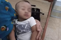 Tìm người thân bé trai 7 tháng tuổi nhặt được trên đường