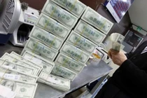 Ngân hàng Nhà nước đang “đỡ” tỷ giá USD/VND