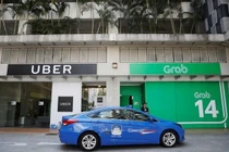 Singapore điều tra thỏa thuận chấn động giữa Uber và Grab
