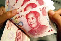 Trung Quốc hạ giá nội tệ, NDT xuống đáy mới