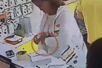 Nữ quái trộm iPhone 6 trước mặt nhân viên không ai hay