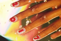 Mẫu móng như hoa nở trên bàn tay để đón Tết