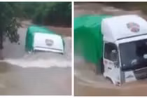 Xe tải chạy băng băng dưới sông không tin nổi