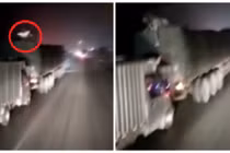 Màn trộm hàng từ xe đang chạy như phim hành động