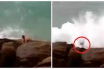 Kinh hoàng cảnh người đàn ông bị sóng dữ hất tung lên trời