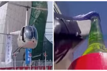 Mở nắp chai bia bằng máy bay trực thăng quá đẳng cấp