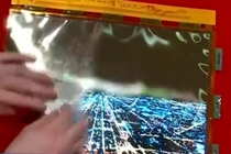 Kinh ngạc chiếc tivi màn hình dẻo có thể cuộn tròn như tờ giấy