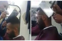 Xem cắt tóc bằng dao và búa chặt thịt lợn