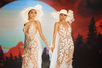 Kỳ Duyên - Minh Triệu mặc váy cưới nắm tay nhau giữa tin đồn yêu đồng tính