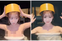 Hot girl quấn khăn tắm, nhô người lên khỏi mặt nước khoe body