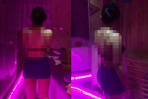 Nữ nhân viên massage xem World Cup với khách...trên giường