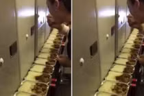 Tiếp viên hàng không Trung Quốc lén ăn suất cơm của hành khách?