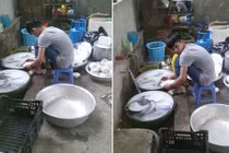 Cậu em rửa 6 mâm bát thay chị gái đau tay gây sốt