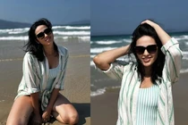 Mẹ vợ của Bùi Tiến Dũng diện bikini, khoe chân dài miên man