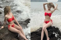 Khoe dáng bên mỏm đá, hot girl khoe làn da sáng như bọt biển