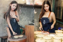 Đứng bán bánh, hot girl “mặc như không” khoe vòng 1 phát ngượng