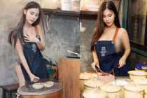 Đứng bán bánh, hot girl “mặc như không” khoe vòng 1 phát ngượng