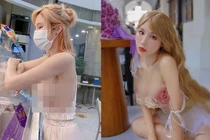 Ngượng đỏ mặt hot girl vô tư “thả rông” vòng một đi mua bánh 
