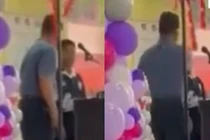 Cười đùa khi hát quốc ca, nam sinh bị giáo viên tát vào mặt