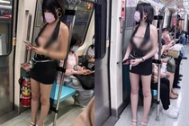 Đỏ mặt hot girl “mặc như không” lộ vòng 1 hớ hênh trên tàu