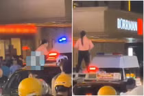 Cô gái phóng uế lên nóc xe giữa phố và kết đắng