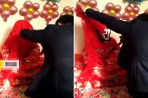 Vào buồng đón dâu, chú rể suýt ngã bật ngửa khi vén khăn đỏ 