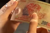 Xem số seri trên tờ tiền biết được tiền giả hay thật?