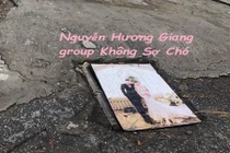 Trời mưa bão, cặp vợ chồng mang ảnh cưới ra làm… nắp cống 