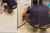 Bố nhét con gái vào máy trò chơi để lấy cắp phần thưởng