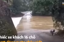 Video: Xe 16 chỗ bị nước cuốn