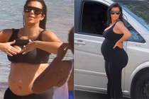 Kim Kardashian khoe bụng bầu trên biển
