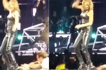 Taylor Swift hoảng hốt vì bị fan cuồng túm chân